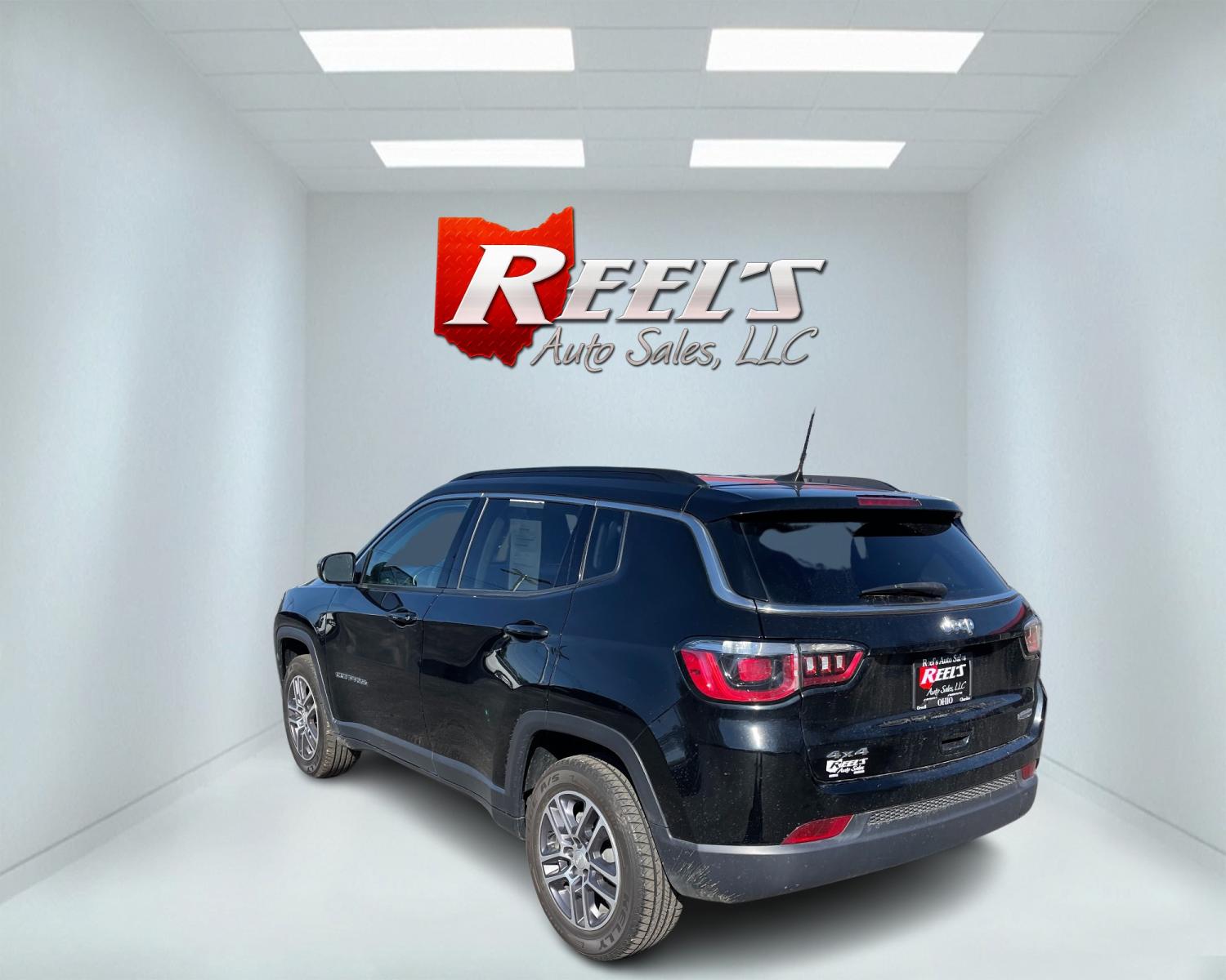 2017 Black /Black Jeep Compass Latitude 4WD (3C4NJDBB9HT) with an 2.4L I4 DOHC 16V engine, 9-Speed Automatic transmission, located at 547 E. Main St., Orwell, OH, 44076, (440) 437-5893, 41.535435, -80.847855 - This 2017 Jeep Compass Latitude 4WD is a capable and well-equipped compact SUV. It features a 2.4L I4 MultiAir engine paired with a 9-speed automatic transmission, delivering a smooth driving experience enhanced by Auto Start/Stop technology. Convenience features include push-button start, remote st - Photo #7